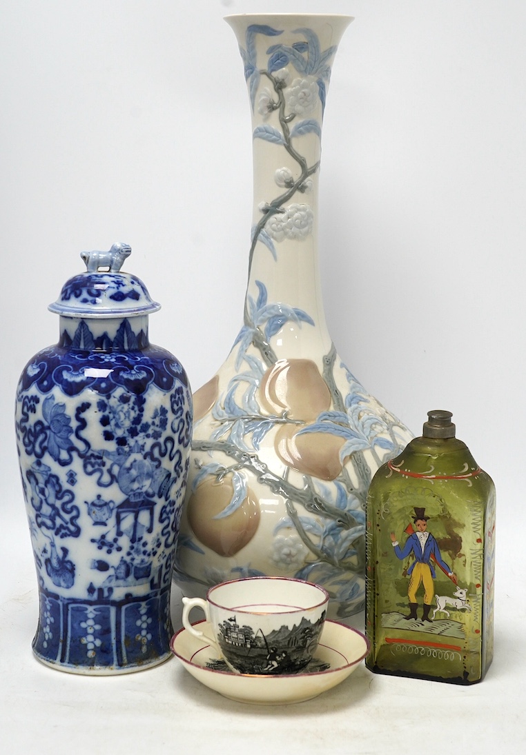 Four ceramic items including a large Lladro vase, 47.5cm high, a Chinese lidded vase, an early 19th century painted bottle and a lustre teacup and saucer. Condition - fair to good